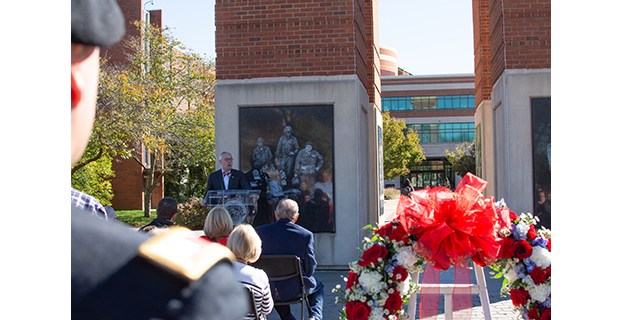 Western Kentucky University President Timothy Caboni speaks Monday at the wreath-laying ceremony beside Guthrie Tower.