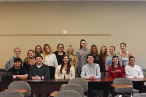 Western Kentucky University public relations classmates pose for a picture Tuesday in a classroom at Gary A. Randsell Hall. They’re campaigning for multiple local causes.