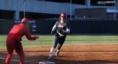 Western Kentucky senior Annie White is congratulated after hitting a home run against Bradley during the Hilltoppers' 6-4 win Sunday at the WKU Softball Complex. (WKU ATHLETICS)