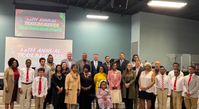 Attendees of the 28th annual Trailblazers Committee Black History Month program pose for a picture on Feb. 23 at the Next Level Church.