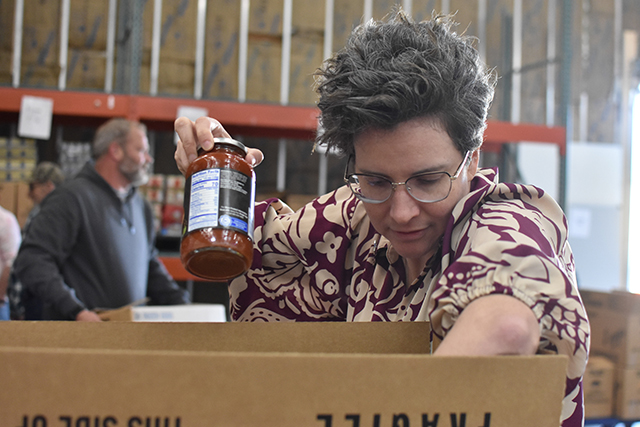 Tori Henninger collects food for the nonprofit she oversees as executive director, the Barren River Area Safe Space.