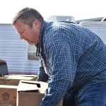 Kevin Crabbe, from St. Joseph SVDP Food Pantry, on Tuesday loads a truck with food food outside House on the Hill — non-perishables donated within Warren County through United Way of Southern Kentucky's Feed the Need food drive.