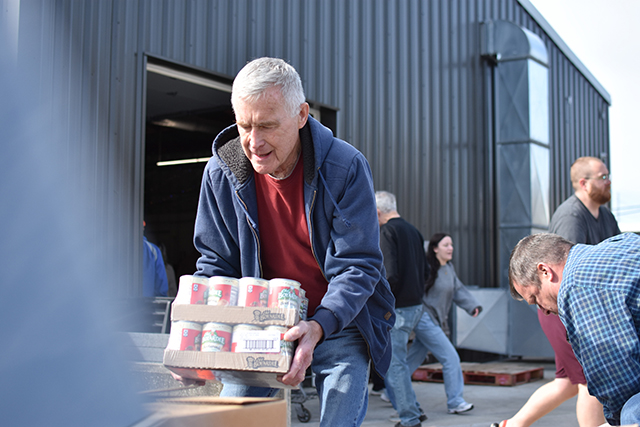 Lloyd Crabbe, from St. Joseph SVDP Food Pantry, loads non-perishables onto a truck that were donated within Warren County through United Way of Southern Kentucky’s Feed the Need food drive.