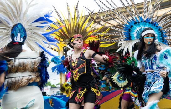Members of the Danza Azteca Quetzalli dance group perform traditional Aztec dances during the biannual BG Fiestaval on Clay Street on Saturday, May 3, 2025. The weekend-long fiesta included traditional Latino and Hispanic dances and music, authentic food from multiple vendors, piñatas, karaoke, contests, games and more.
GRACE MCDOWELL / DAILY NEWS