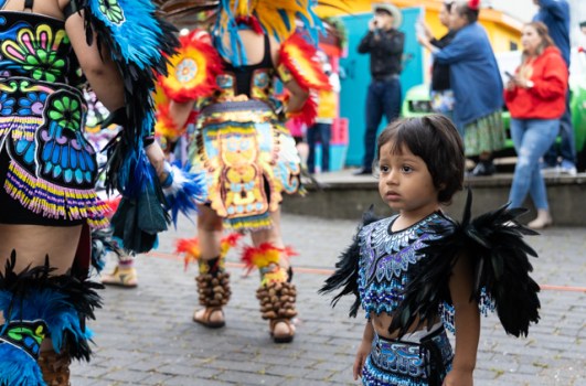 Miguel Martinez, 1, watches as the Danza Azteca Quetzalli dance group performs traditional dances during the biannual BG Fiestaval on Clay Street on Saturday, May 3, 2025. The weekend-long fiesta included traditional Latino and Hispanic dances and music, authentic food from multiple vendors, piñatas, karaoke, contests, games and more.
GRACE MCDOWELL / DAILY NEWS