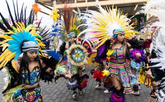 Members of the Danza Azteca Quetzalli dance group perform traditional Aztec dances during the biannual BG Fiestaval on Clay Street on Saturday, May 3, 2025. The weekend-long fiesta included traditional Latino and Hispanic dances and music, authentic food from multiple vendors, piñatas, karaoke, contests, games and more.
GRACE MCDOWELL / DAILY NEWS